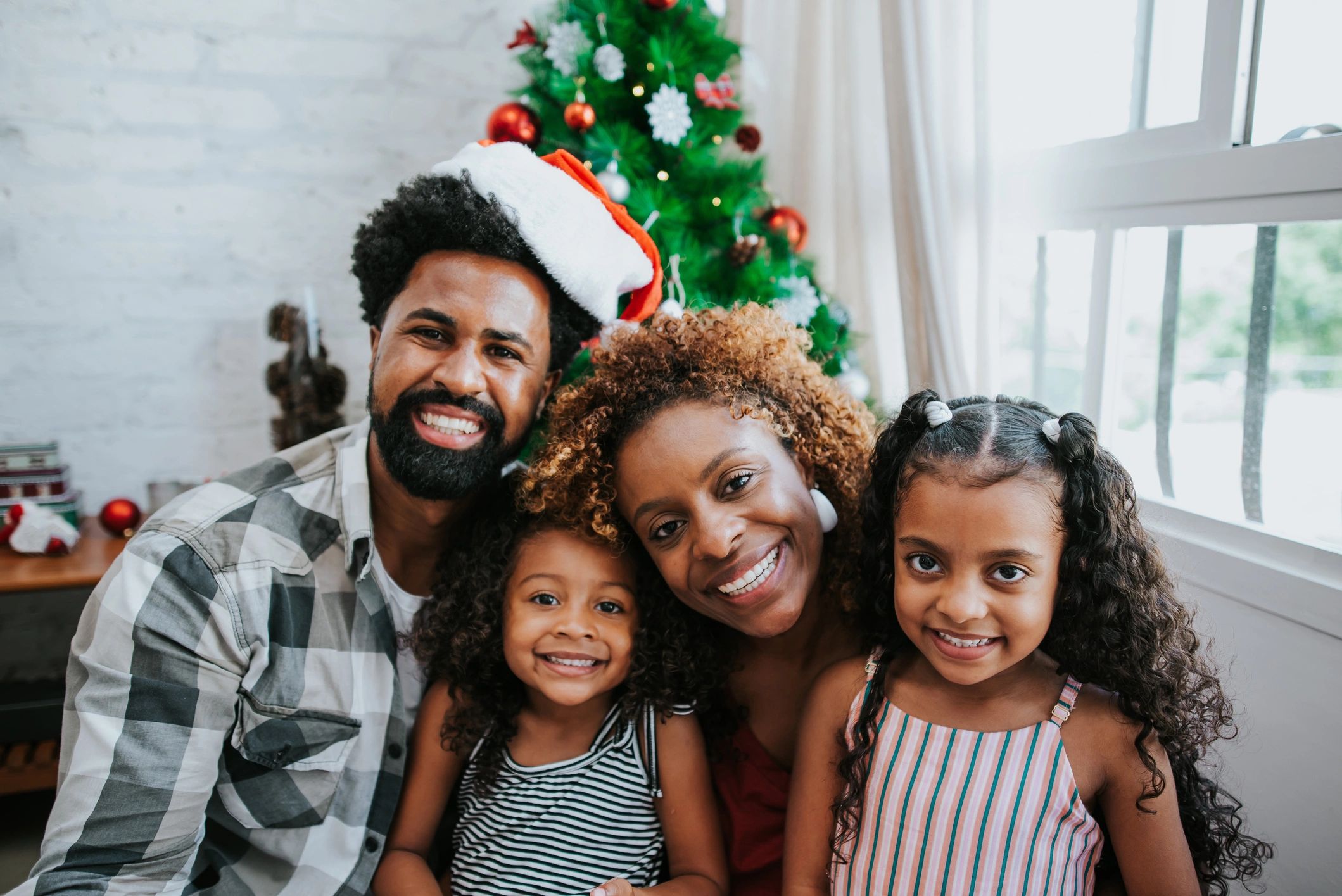 happy family with Santa Claus Christmas party event festive